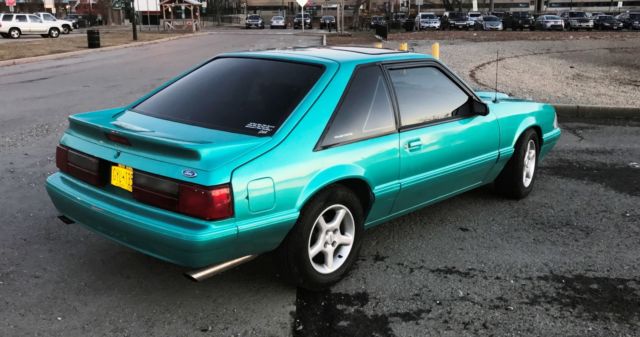 1993 Calypso Coral Ford Mustang Hatchback