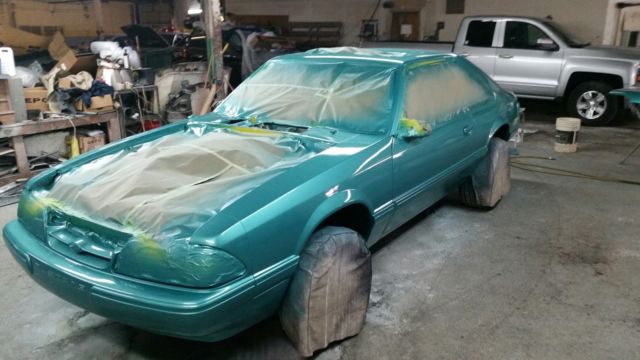 1993 Calypso Coral Ford Mustang Hatchback