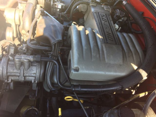 1993 Red Ford Mustang Convertible