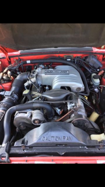 1993 Red Ford Mustang Convertible