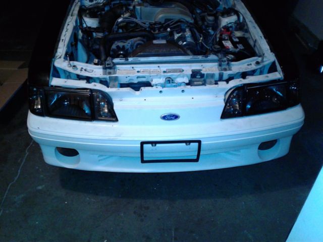 1993 White and Black Ford Mustang Convertible