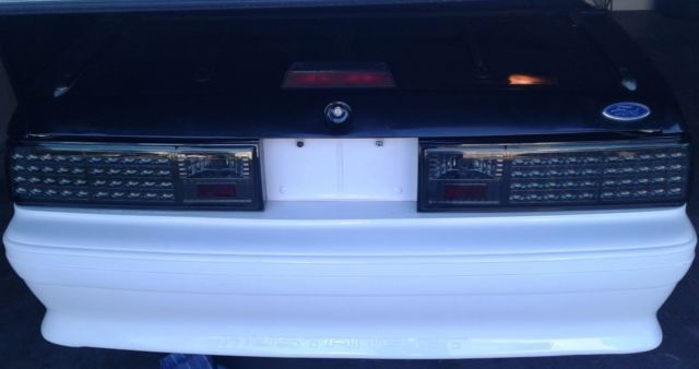 1993 White and Black Ford Mustang Convertible