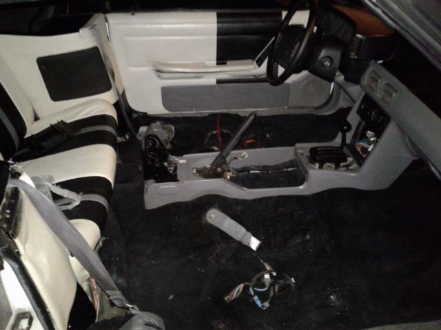 1993 White and Black Ford Mustang Convertible