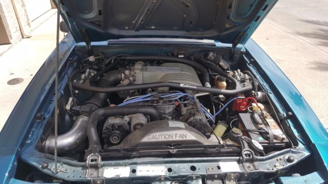 1993 Coral Blue Ford Mustang Hatchback