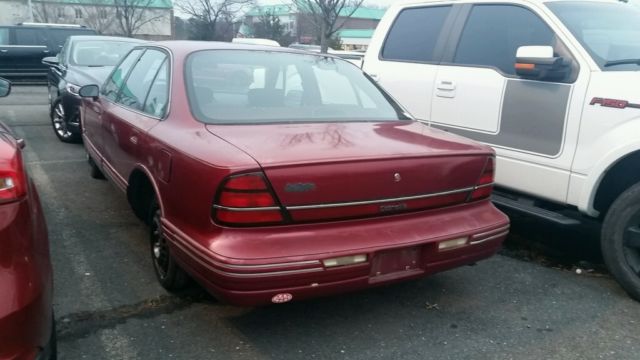 1993 Red Oldsmobile Eighty-Eight Sedan