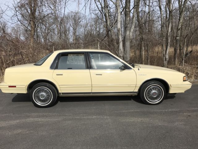 1993 Yellow Oldsmobile Ciera Sedan
