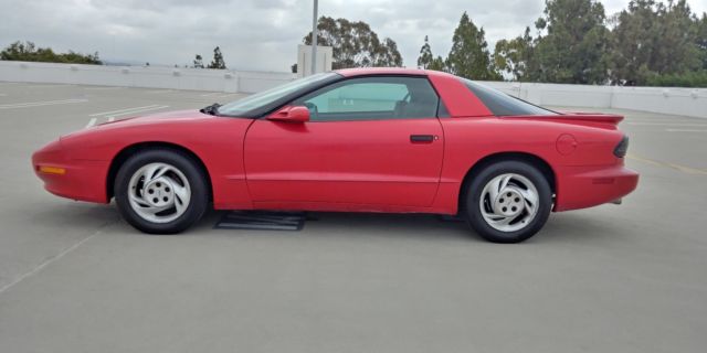 1993 Red Pontiac Firebird Coupe