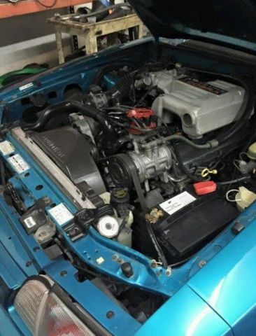 1993 Teal Ford Mustang Hatchback