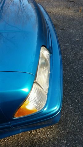 1993 Teal Ford Mustang Hatchback