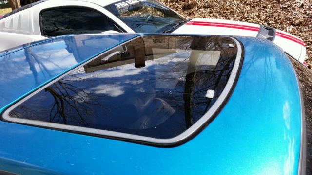 1993 Teal Ford Mustang Hatchback