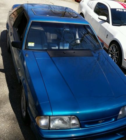 1993 Teal Ford Mustang Hatchback