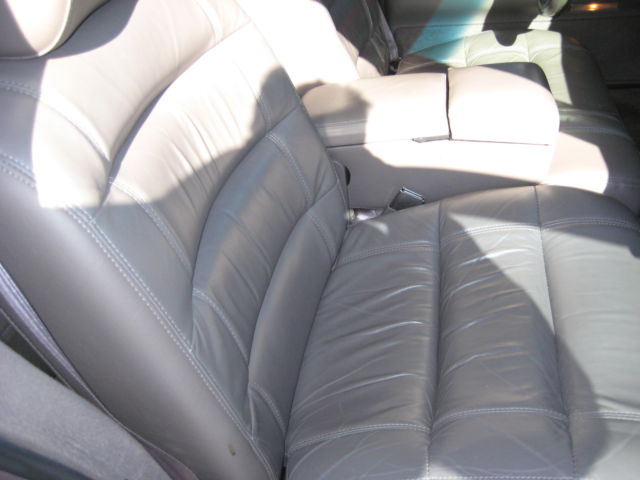 1994 Brown Cadillac Fleetwood 4dr sedan