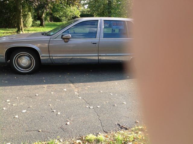 1994 Brown Cadillac Fleetwood 4dr sedan