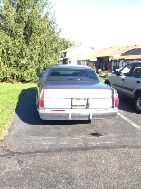 1994 Brown Cadillac Fleetwood 4dr sedan