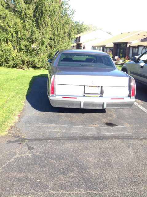 1994 Brown Cadillac Fleetwood 4dr sedan