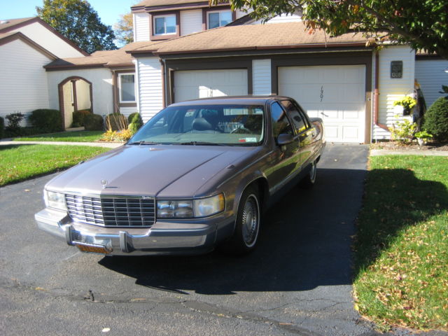 1994 Brown Cadillac Fleetwood 4dr sedan