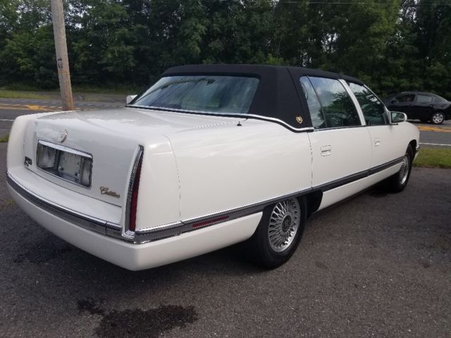 1994 White Cadillac DeVille Sedan