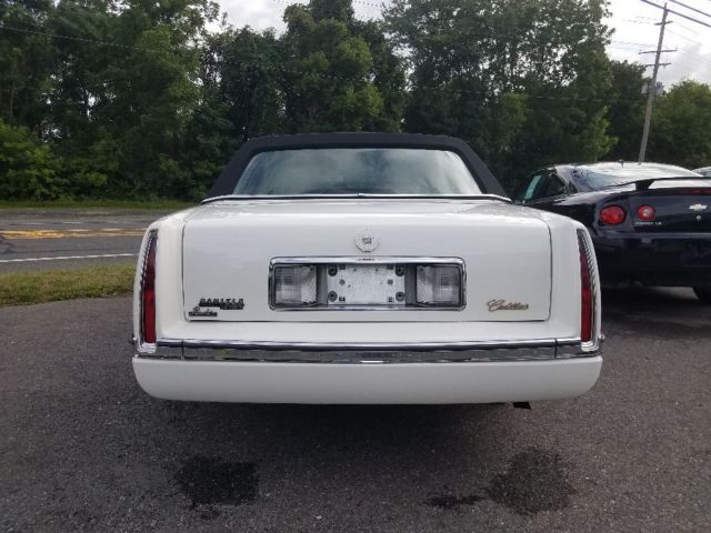1994 White Cadillac DeVille Sedan
