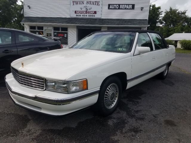 1994 White Cadillac DeVille Sedan