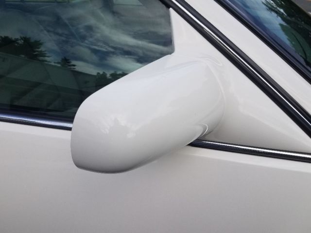 1994 White Cadillac DeVille Sedan