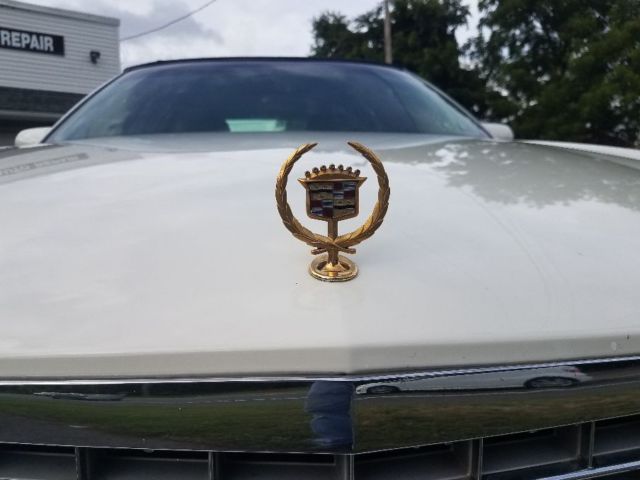 1994 White Cadillac DeVille Sedan