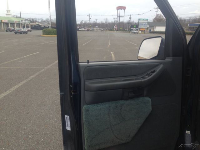 1994 Blue Ford E-Series Van Wagon