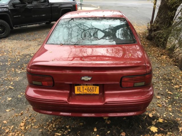1994 Garnet red Chevrolet Capriceold Sedan