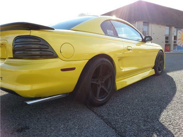 1994 Yellow Ford Mustang custom