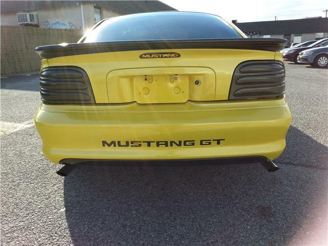 1994 Yellow Ford Mustang custom