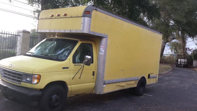 1994 Yellow Ford E-Series Van Box with overhead cabin space