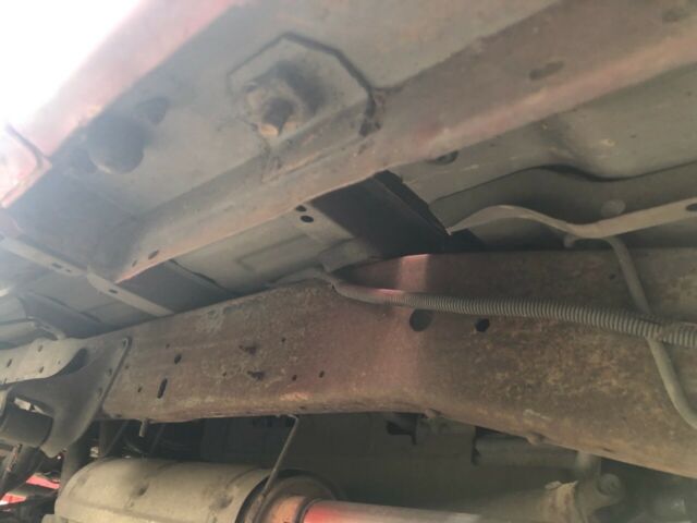 1994 Red Ford F-250 Standard Cab Pickup