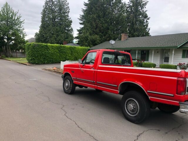 1994 Red Ford F-250 Standard Cab Pickup