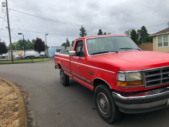1994 Red Ford F-250 Standard Cab Pickup
