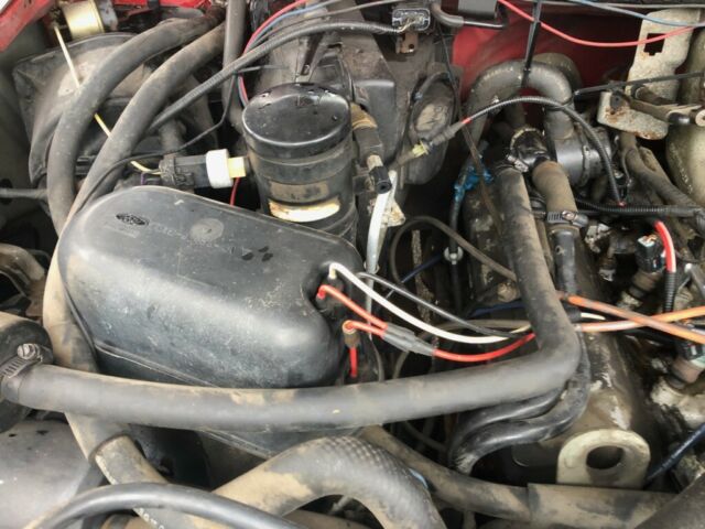 1994 Red Ford F-250 Standard Cab Pickup