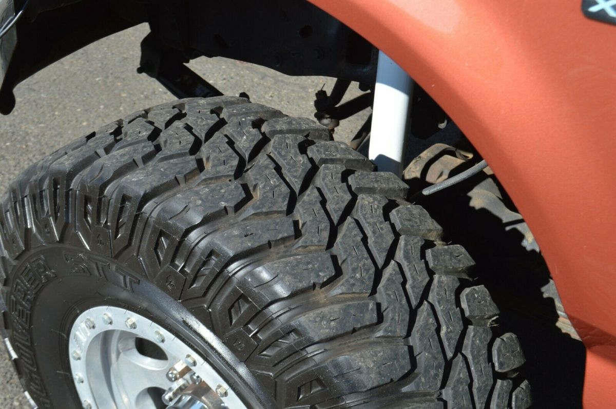 1994 Orange Ford F-350 Standard Cab Pickup