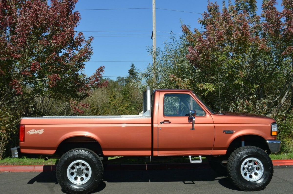 1994 Orange Ford F-350 Standard Cab Pickup