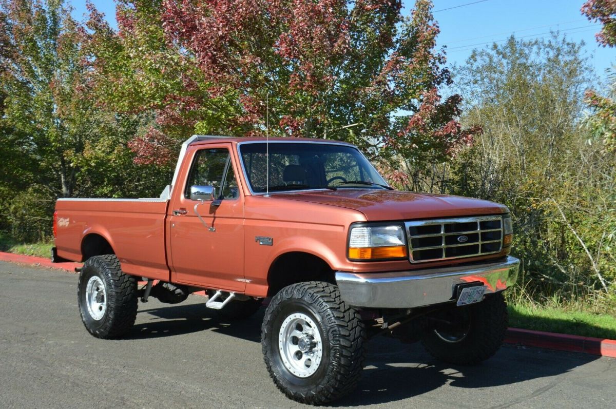 1994 Orange Ford F-350 Standard Cab Pickup
