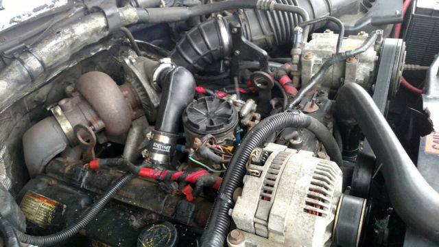 1994 Blue Ford F-450 STAKE BODY DUMP