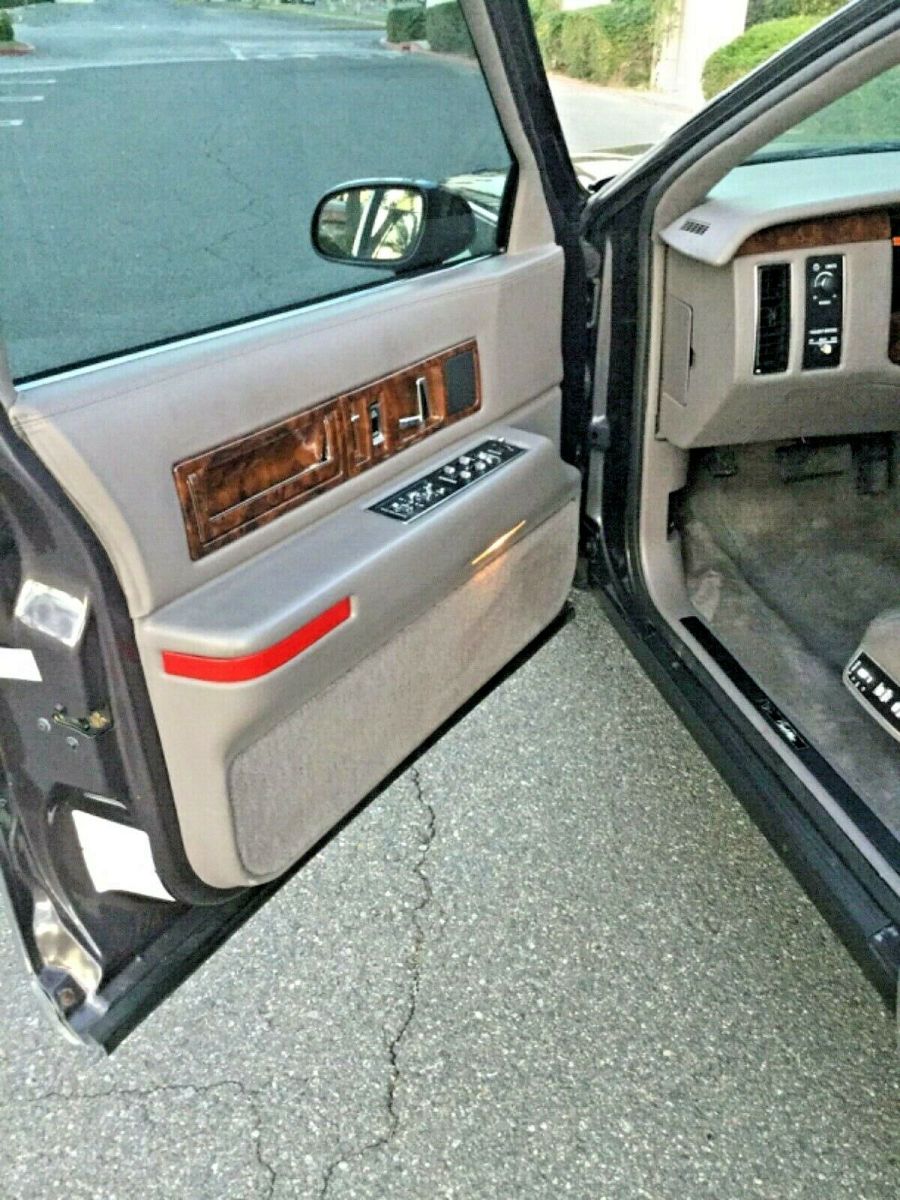 1994 Majestic Amethyst Cadillac Brougham Sedan