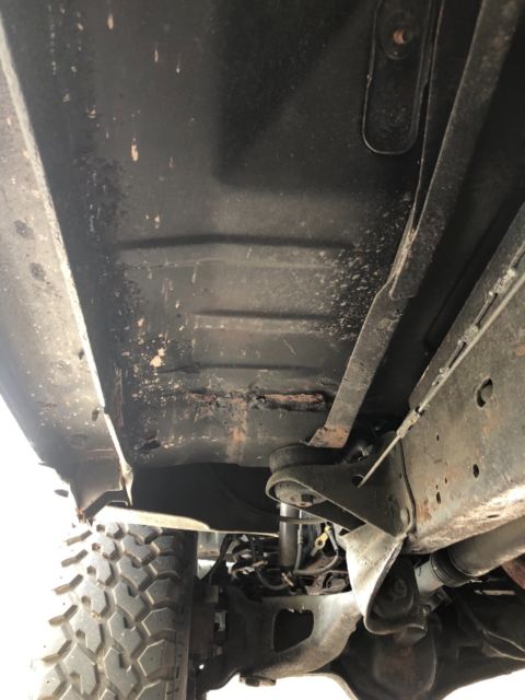 1994 White/ Blue Ford Bronco SUV