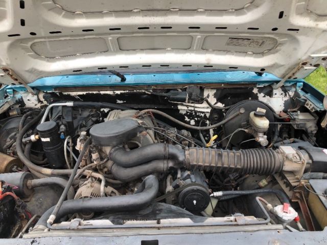 1994 White/ Blue Ford Bronco SUV