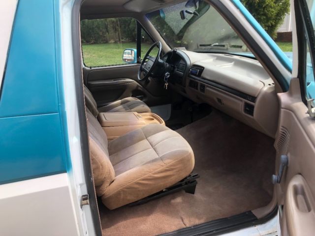 1994 White/ Blue Ford Bronco SUV