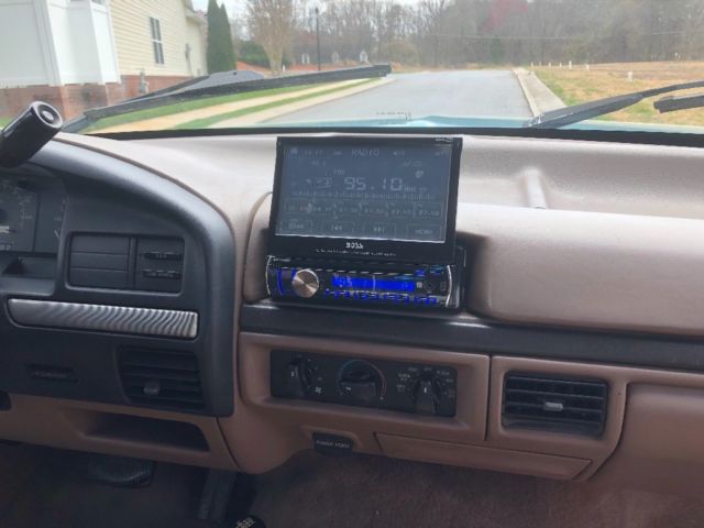 1994 White/ Blue Ford Bronco SUV