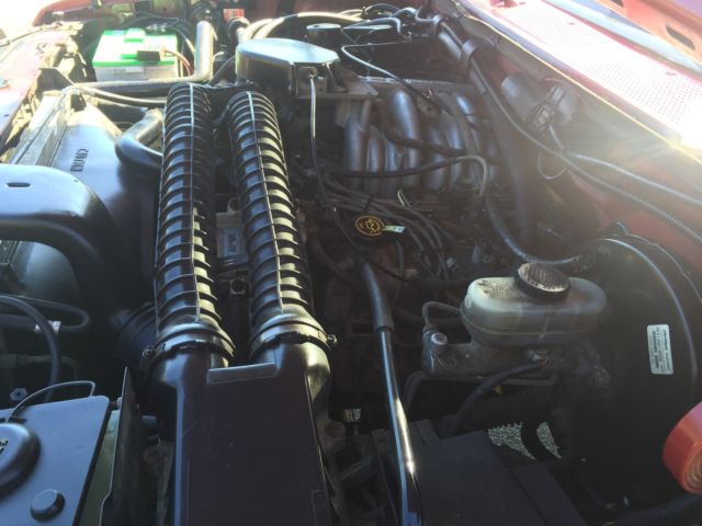 1994 Burgundy Ford Bronco SUV