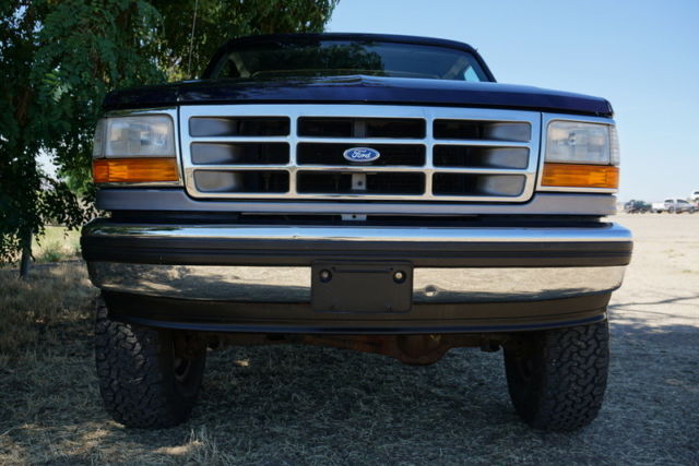 1994 Dark Blue & Silver Ford Bronco SUV