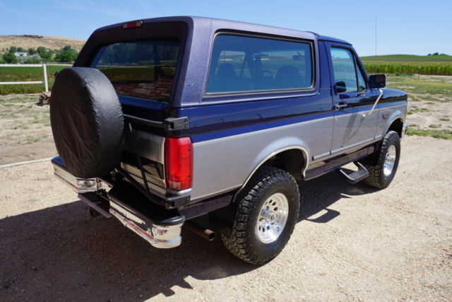 1994 Dark Blue & Silver Ford Bronco SUV