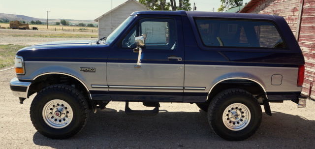 1994 Dark Blue & Silver Ford Bronco SUV
