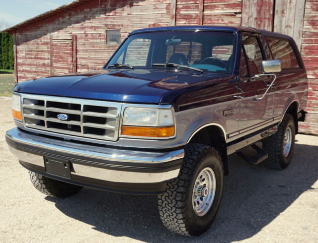 1994 Dark Blue & Silver Ford Bronco SUV