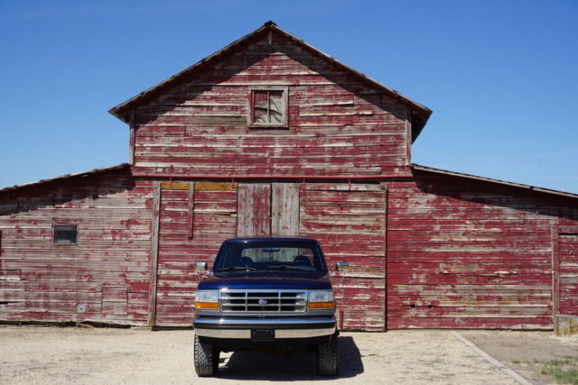 1994 Dark Blue & Silver Ford Bronco SUV