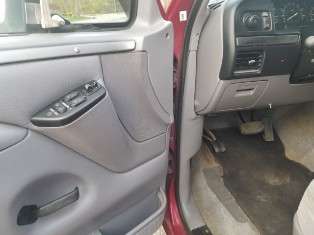 1994 Red Ford Bronco Wagon